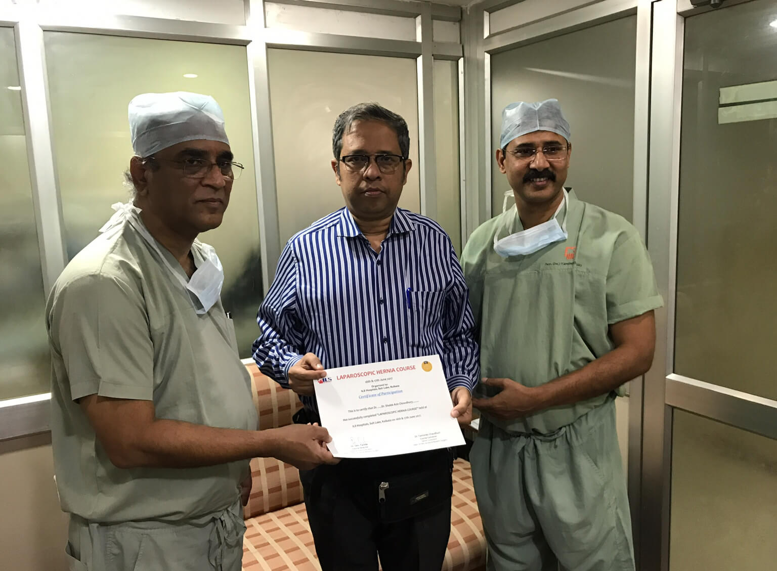 eceiving certificate for attending ‘Laparoscopic Hernia Course’